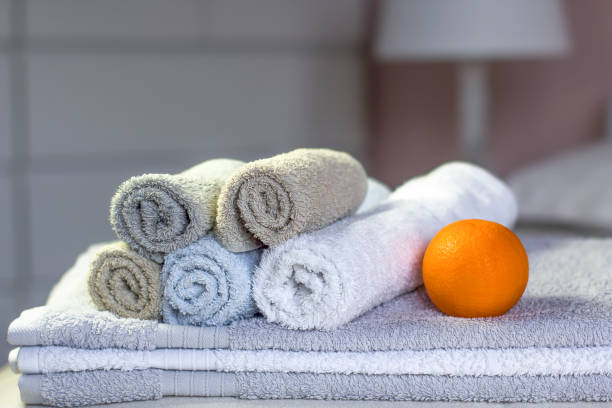 istock Stack of bath towels on bed decoration in bedroom interior 1144203440