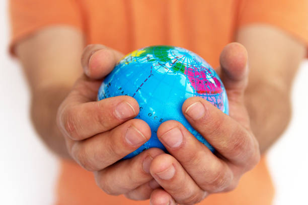 istock Hand of the person holds globe 1144205217