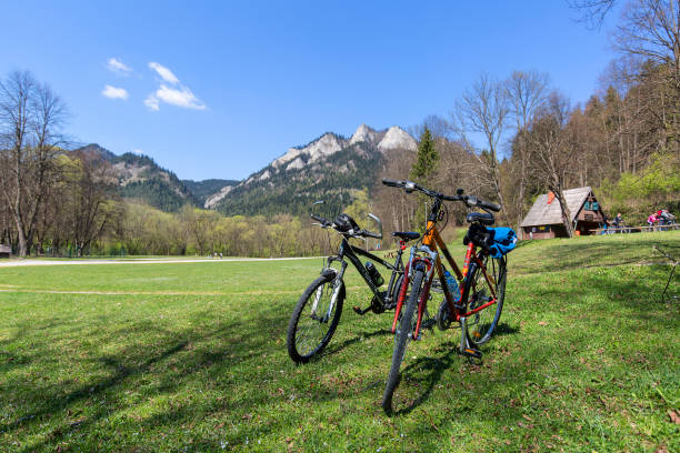 View on Three Crowns Massif, Pieniny Mountains, Dunajec River Gorge, Poland Dunajec River George, Poland - April 20, 2019: View on Three Crowns Massif from the side of the Red Monastery, Pieniny Mountains, tourist bikes szczawnica stock pictures, royalty-free photos & images