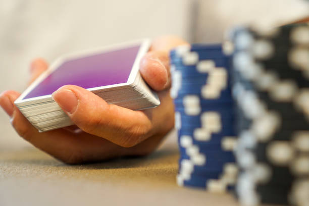 playing cards with poker chips at poker table
