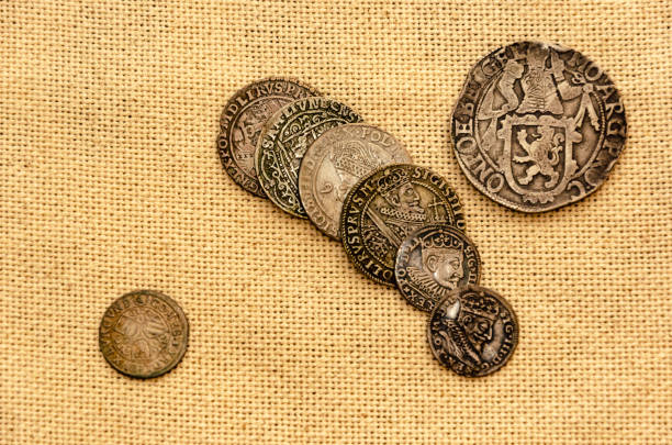 istock Silver coins on linen background 1144211901