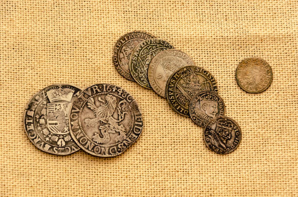 istock Silver coins on linen background 1144211954