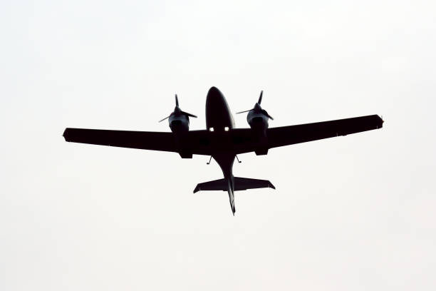 istock twin-engine light aircraft flying in the sky 1144212413