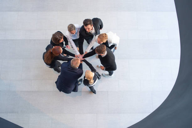 istock Businesspeople with their hands together 1144212470