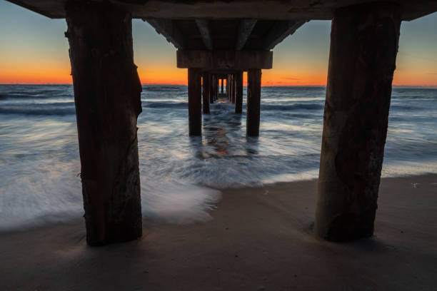 istock Fishing Pier Sunrise at the Beach 1144215643