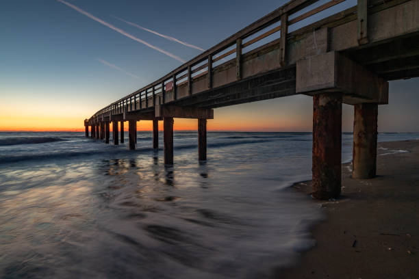 istock Fishing Pier Sunrise at the Beach 1144215913
