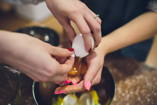 istock the cook separates the yolk in egg 1144216350