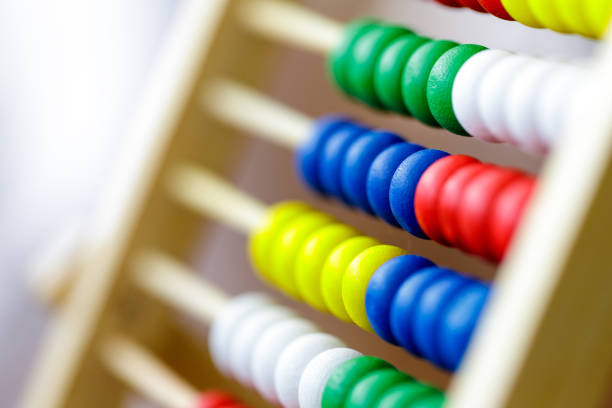 istock Colorful vintage style wooden abacus. For Learning Basic Mathematics Calculator - Close up 1144221925