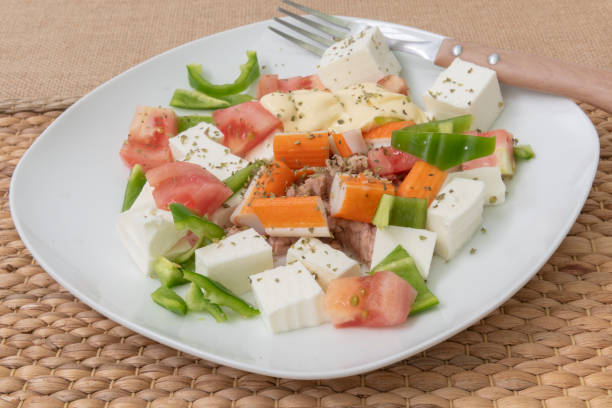 Plate of tuna salad and fresh cheese