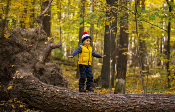 istock Young boy in a vest and hat 1144222124