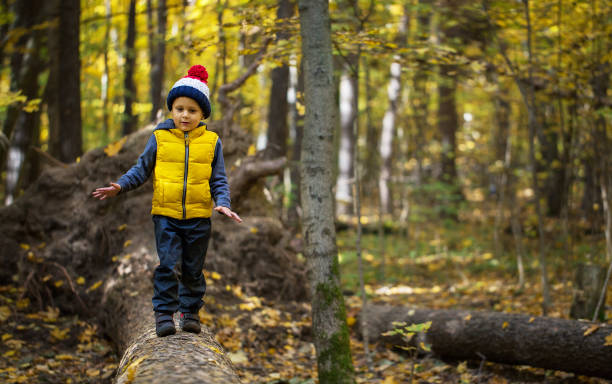 istock Young boy in a vest and hat 1144222130