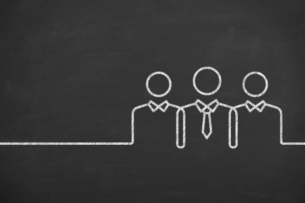 istock Teamwork Concepts with Business Person on Chalkboard Background 1144222279