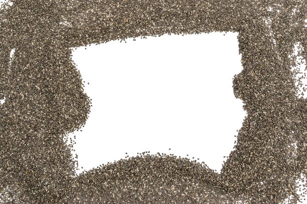 istock Isolated mock up frame with dry chia seeds. View from top, white background, design element. Paleo diet concept. 1144225109