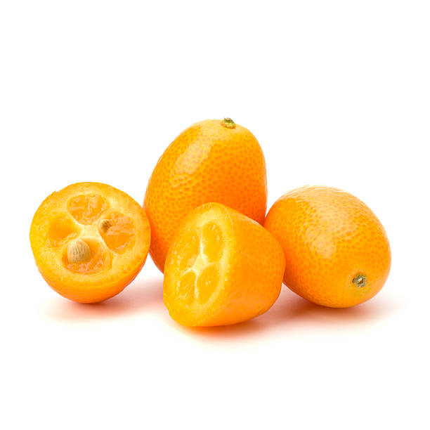 istock Three kumquats on a white background with one sliced in two 114422853
