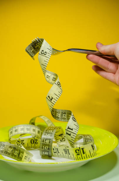 istock a plate with measuring tape 1144228566