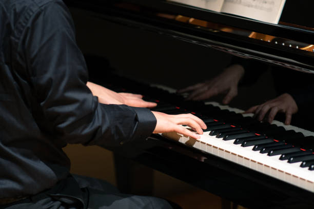 Man playing piano at classical music concert