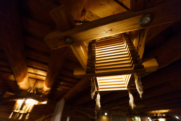 istock Wooden light chandelier at a ceiling LAtvia 1144229395