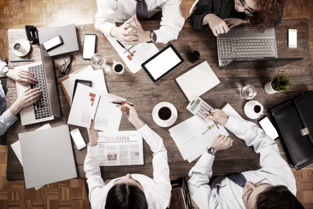 istock people around business meeting table 1144229464
