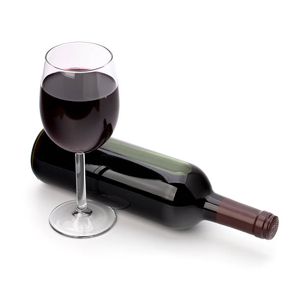 istock Full red wine glass goblet and bottle 114423113