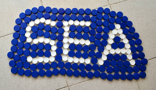 Using bottle caps to describe the importance or recycling