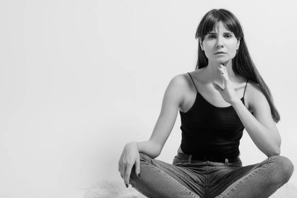 istock pensive relaxed pretty woman meditation 1144235446