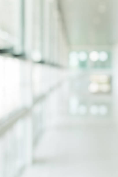 istock Office building blur background business lobby reception hall interior or empty indoor foyer meeting room with blurry light from glass wall window 1144238677