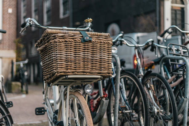 istock Classic bycicle with basket in Amsterdam, Europe 1144239123