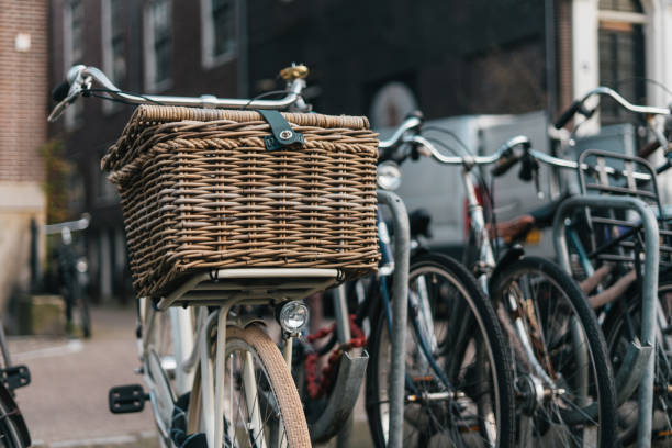 Classic bycicle with basket in Amsterdam, Europe