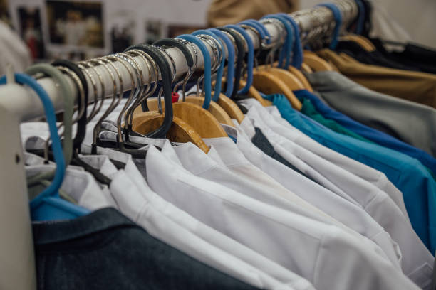 istock White and colored medical robes on hangers 1144239147