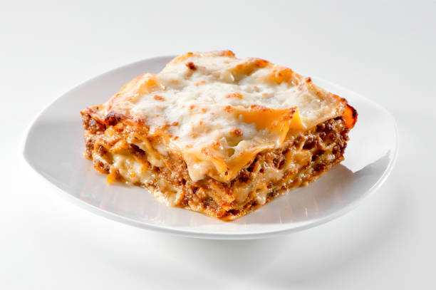 lasagna piece on white plate close-up