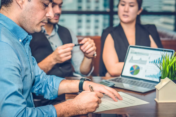 istock businessman signing contract on table 1144242317
