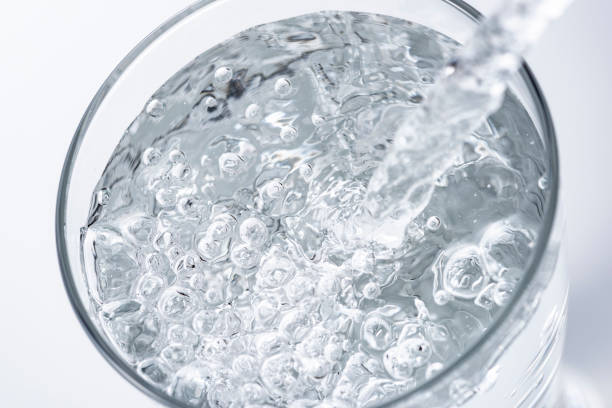 istock Pouring water into a glass 1144242386