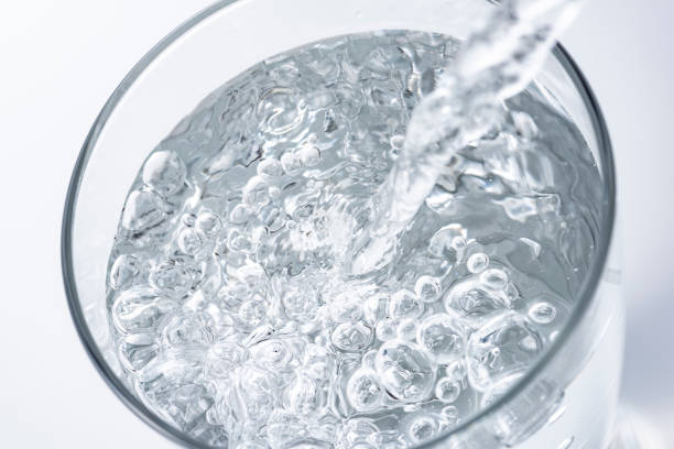 istock Pouring water into a glass 1144242404