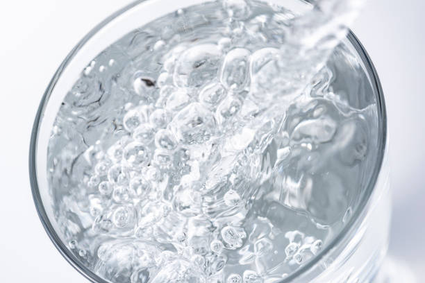 istock Pouring water into a glass 1144242429