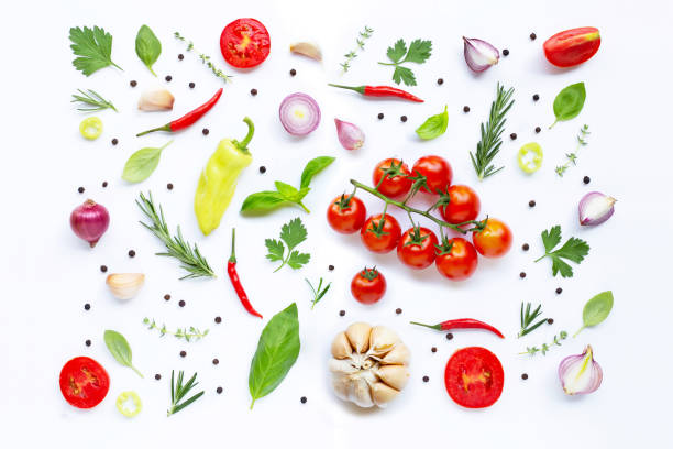istock Various fresh vegetables and herbs on white background. Healthy eating concept 1144243831