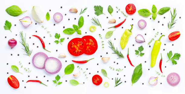 istock Various fresh vegetables and herbs on white background. Healthy eating concept 1144243838