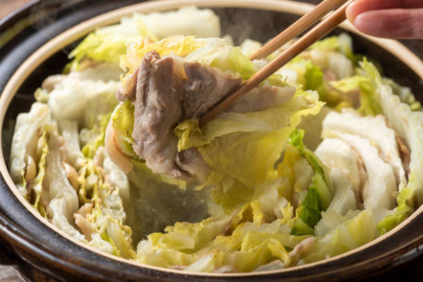 istock Layered pot of Chinese cabbage and pork roses 1144244575