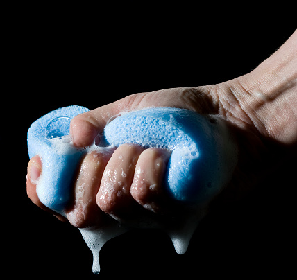 squeezing a blue bath sponge
[url=file_closeup.php?id=9931041][img]file_thumbview_approve.php?size=1&id=9931041[/img][/url] [url=file_closeup.php?id=9937703][img]file_thumbview_approve.php?size=1&id=9937703[/img][/url]