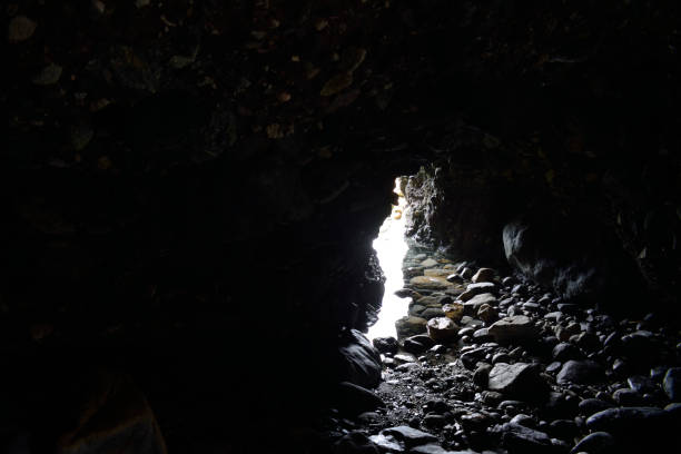 Light pours into the entrance of Pirate's Cave...a sea cave located at a Dana Point beach in Orange County, California.
