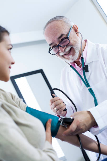 istock Doctor examining woman 1144255111