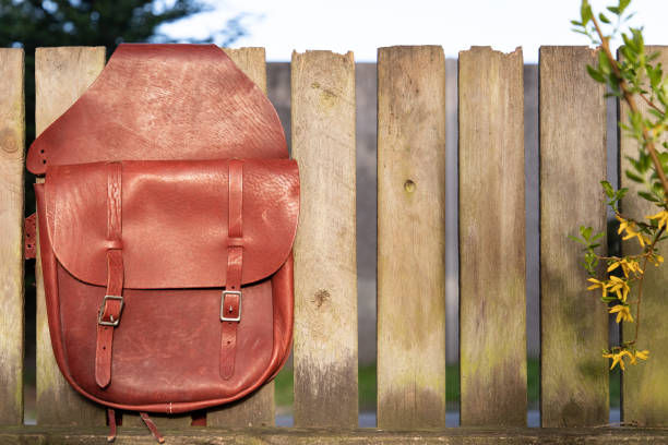 Western Style Sadde Bag on Fence