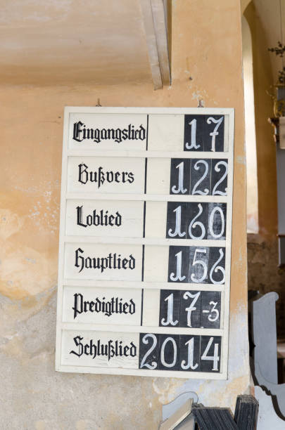 Numbers from the Bible verses Agarbiciu/Romania - August 08 2014: Numbers from the Bible verses to be read during the Mass. This is a common practice in evangelical churches. verses stock pictures, royalty-free photos & images