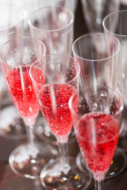 istock Glasses with red champagne drink. 1144258312