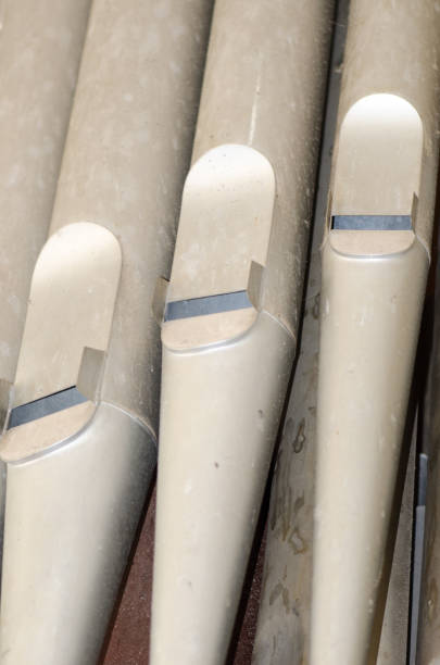 Close up of old and dusty organ pipes