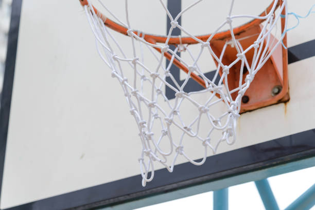 istock Basketball hoop outdoors at cloudy day. Sport concept 1144261997