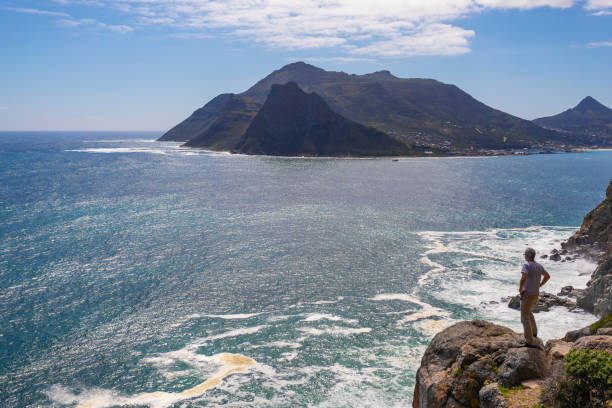 istock Man Looking at the View From a Clifftop 1144262961