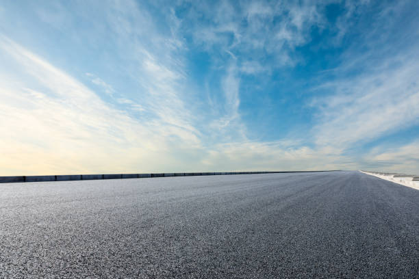 istock Asphalt road and sky cloud background 1144268858
