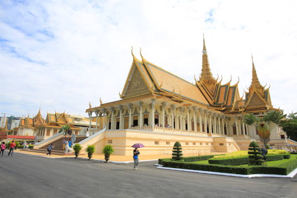 People visible eating at Wat Preah Prom Rath In Siem Reap, Cambodia