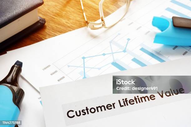 Customer Lifetime Value Clv Or Cltv Report Papers Stock Photo - Download Image Now - Making Money, Life Events, Customer