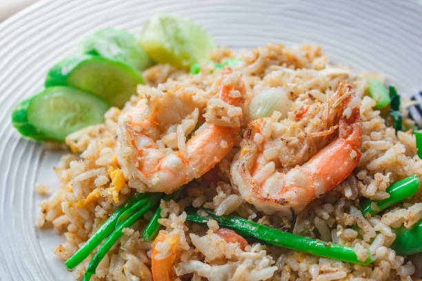 istock Fried rice with shrimp on the white dish. 1144275829